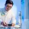 A researcher in a lab coat performing an experiment on a metal pipe
