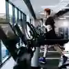 Man running on a treadmill in the Allam Sport Centre