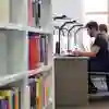 students working in a study space in the library