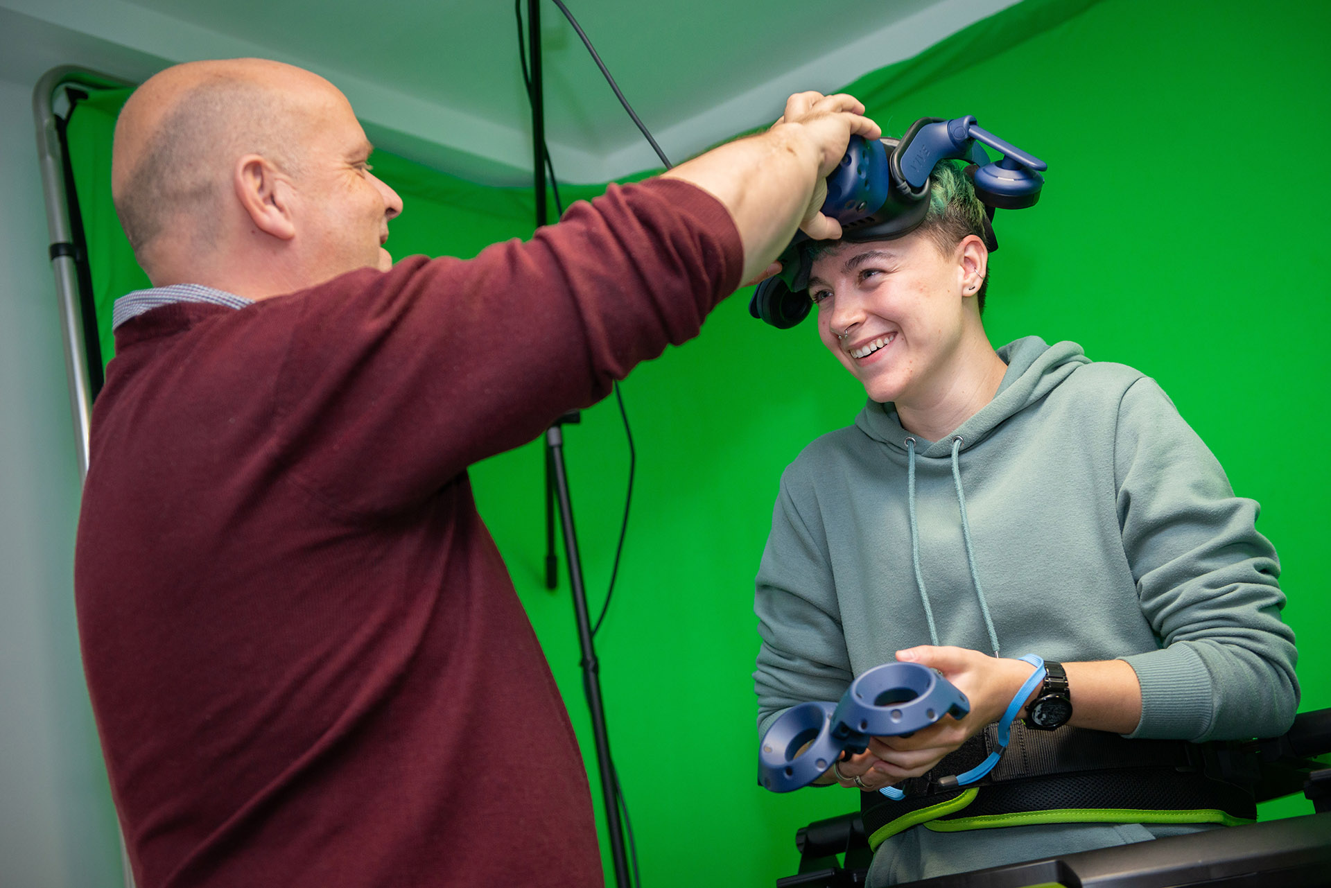 Student and instructor using a VR headset and controllers