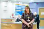 Trainee doctor in a hospital foyer