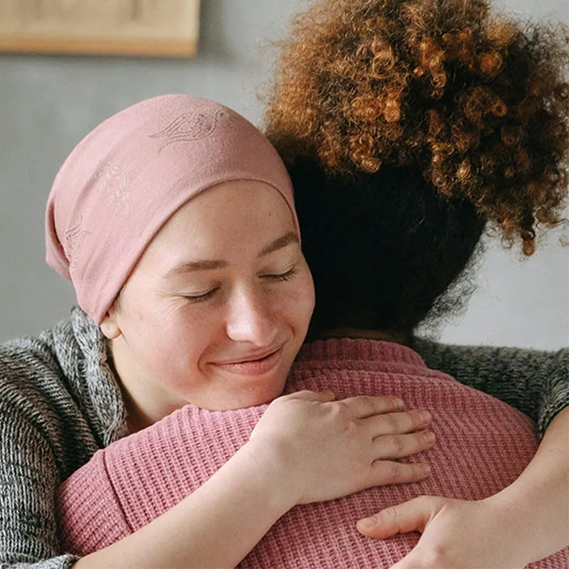 Patient being hugged by a care worker