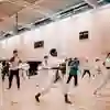 A group doing Karate in the Allam Sports Centre